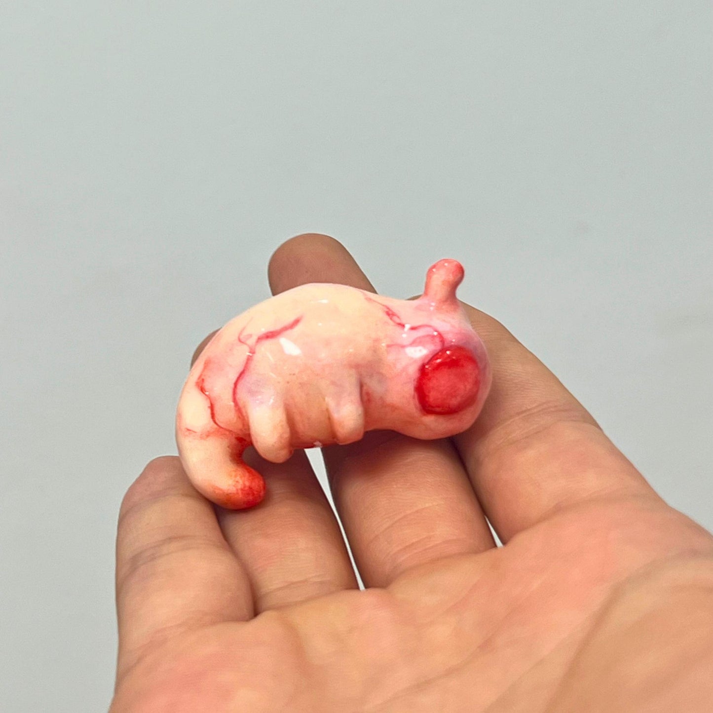 Handcrafted Creepy Cute Alien Embryo Monster Statue - A Striking Bloody Embryo Sculpture