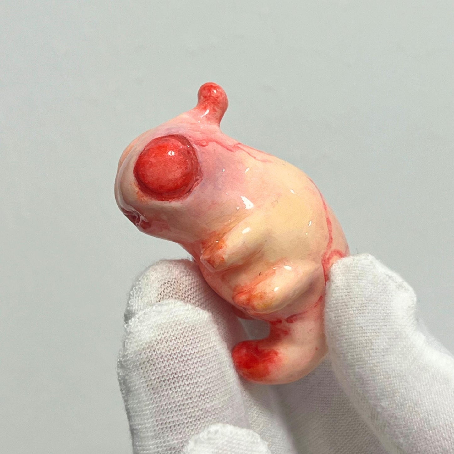Handcrafted Creepy Cute Alien Embryo Monster Statue - A Striking Bloody Embryo Sculpture