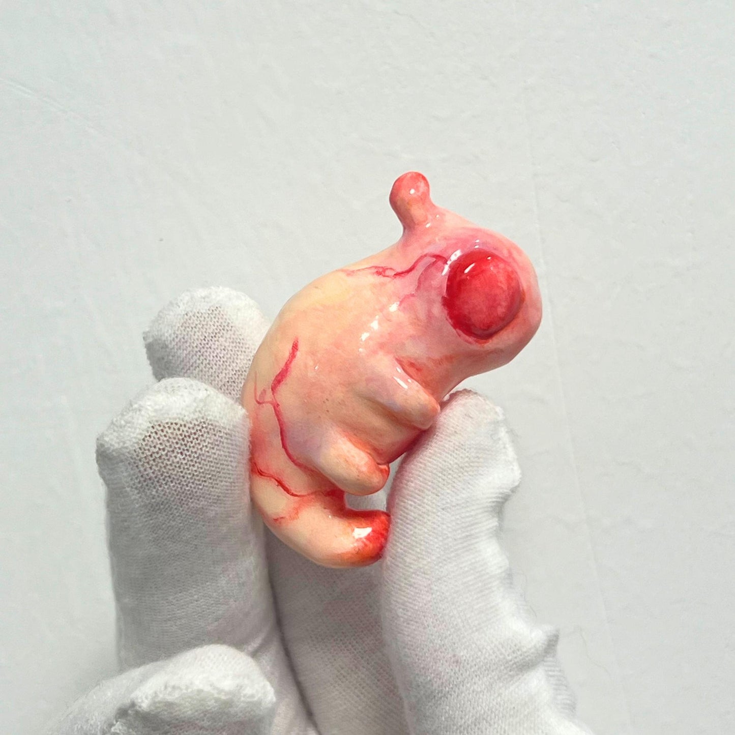 Handcrafted Creepy Cute Alien Embryo Monster Statue - A Striking Bloody Embryo Sculpture