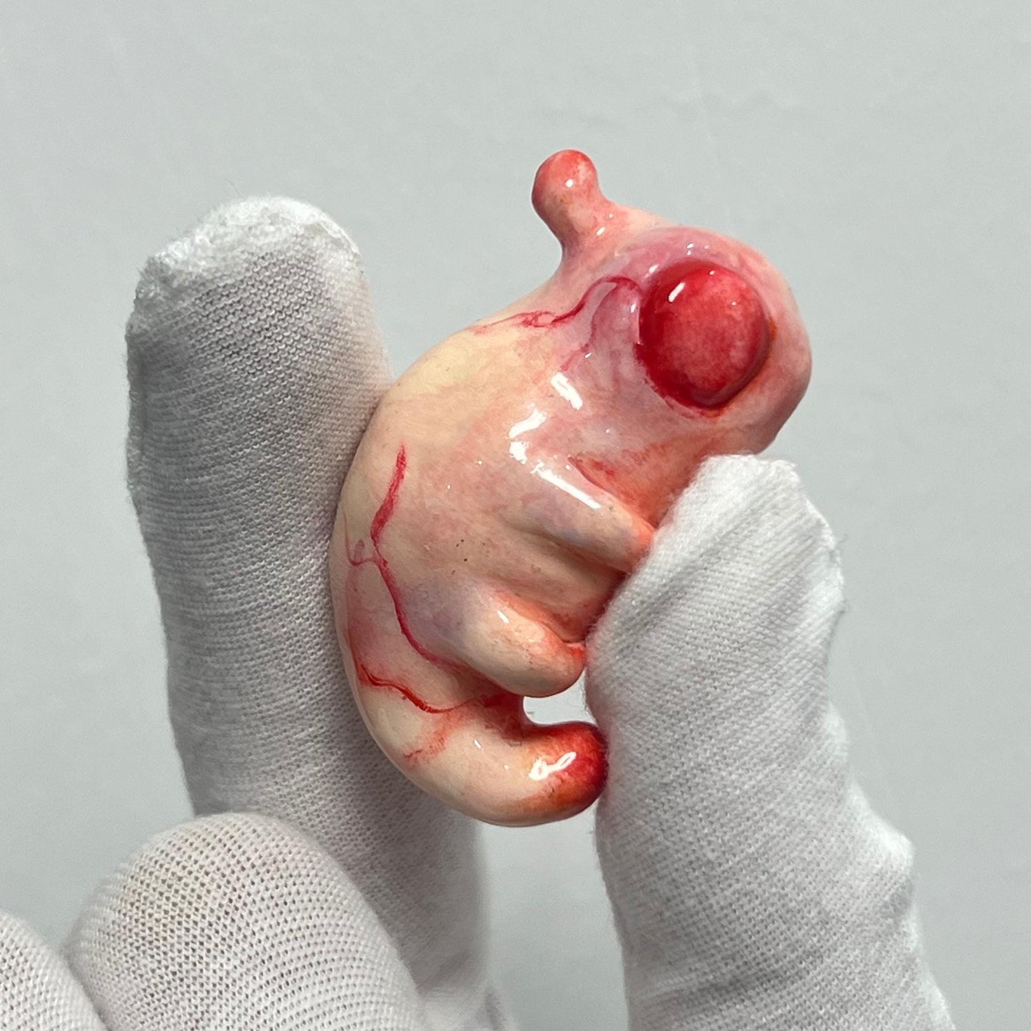 Handcrafted Creepy Cute Alien Embryo Monster Statue - A Striking Bloody Embryo Sculpture
